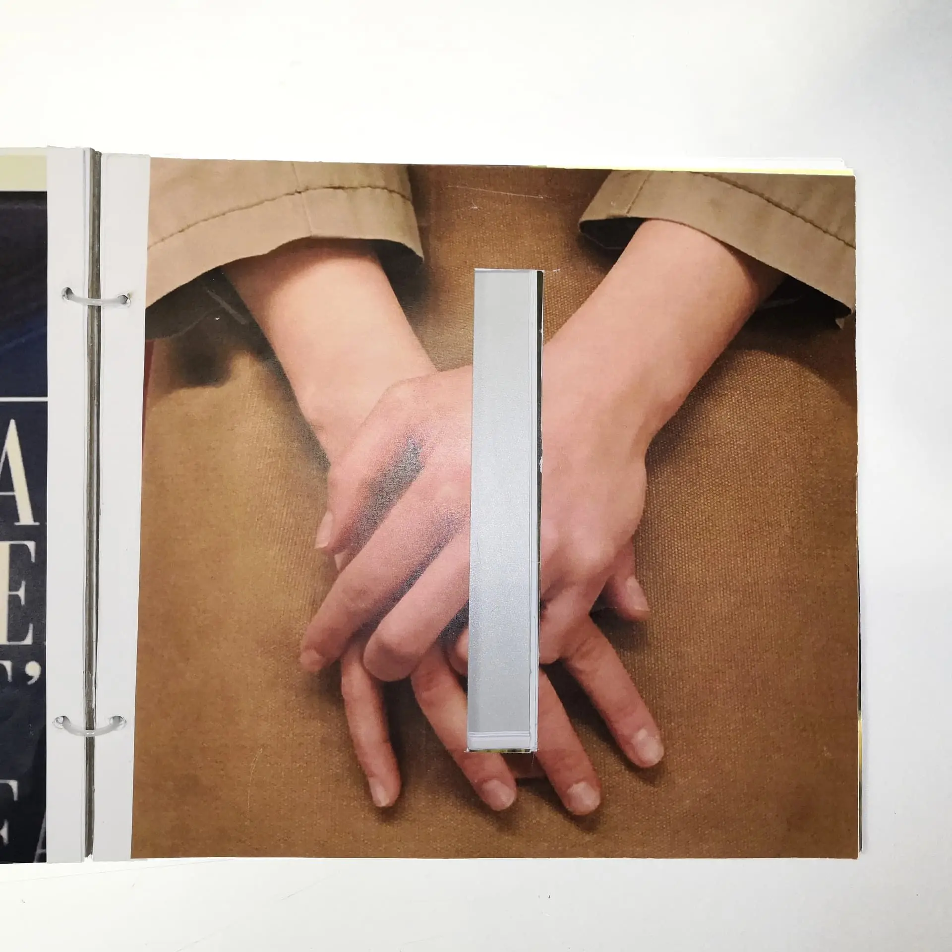 Final book — detail of sculptural pole element and pages