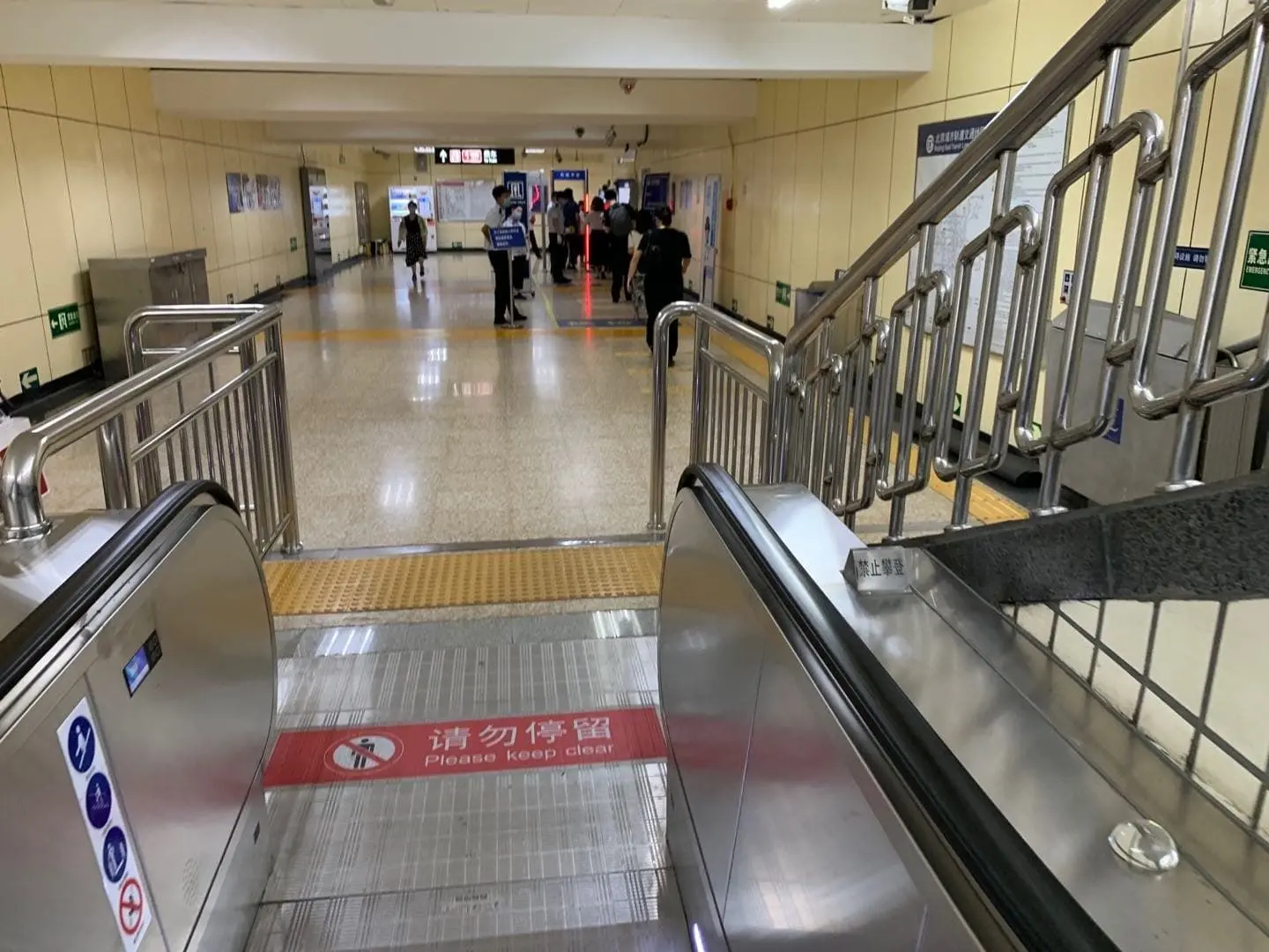 Walking towards security check in Beijing subway