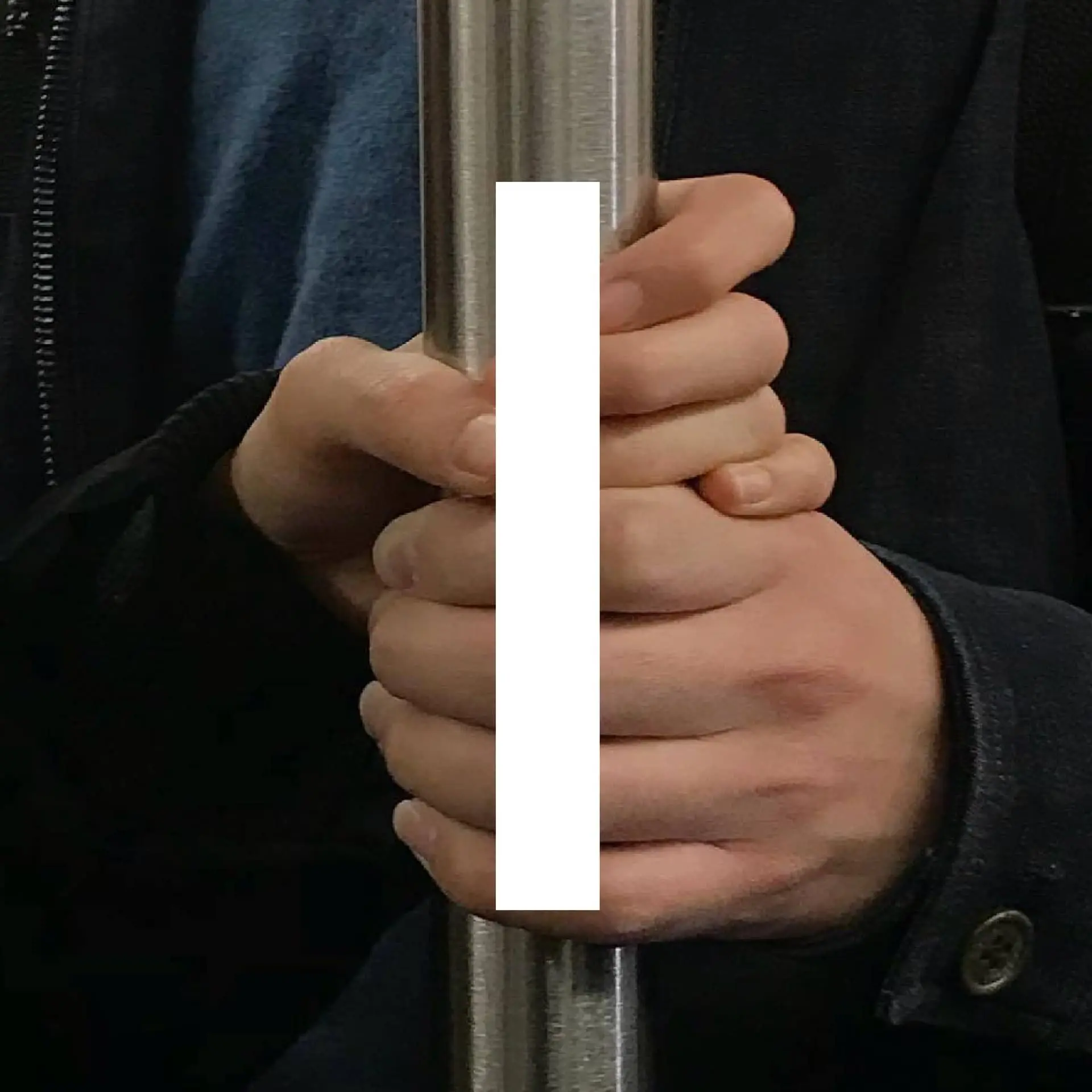 Book spread — hands gripping pole