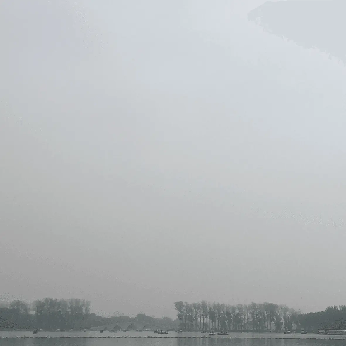 Polluted sky with faint sun